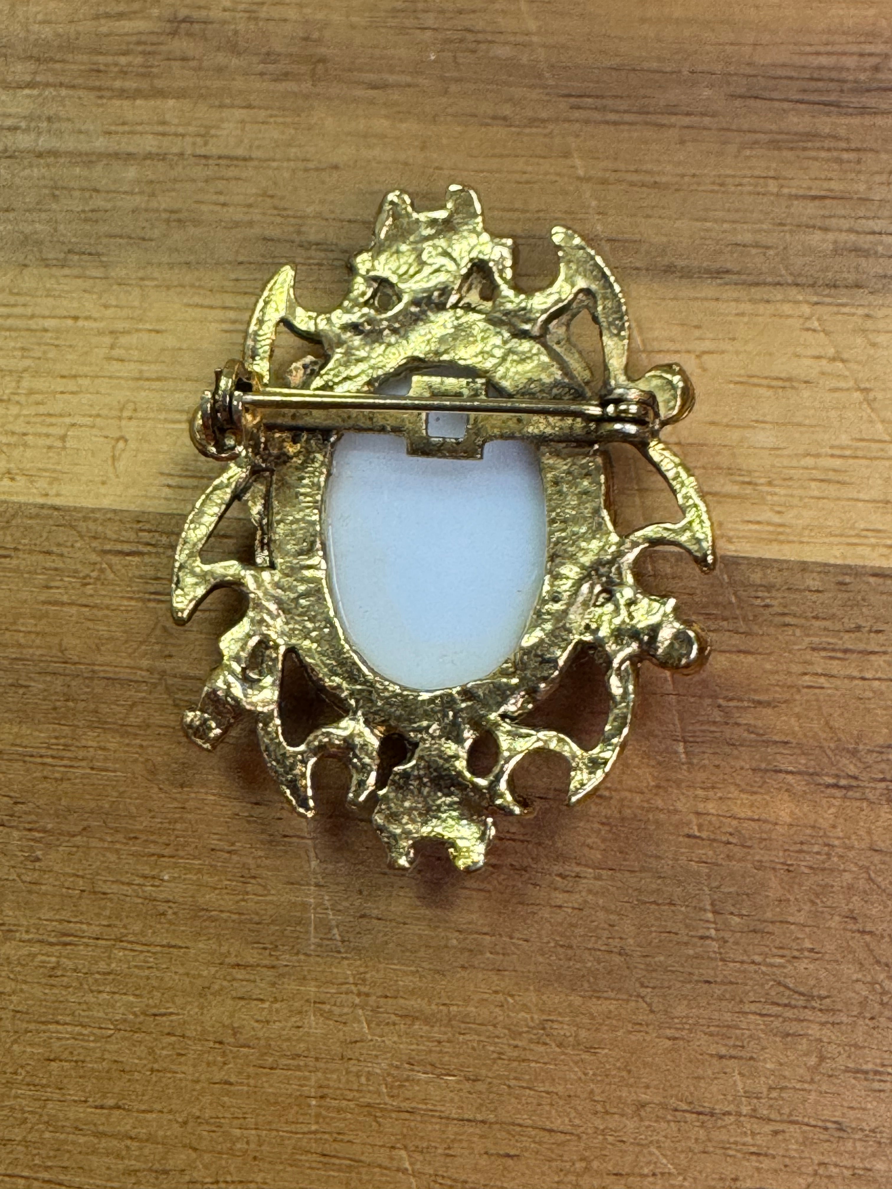 Vintage gold tone & porcelain brooch