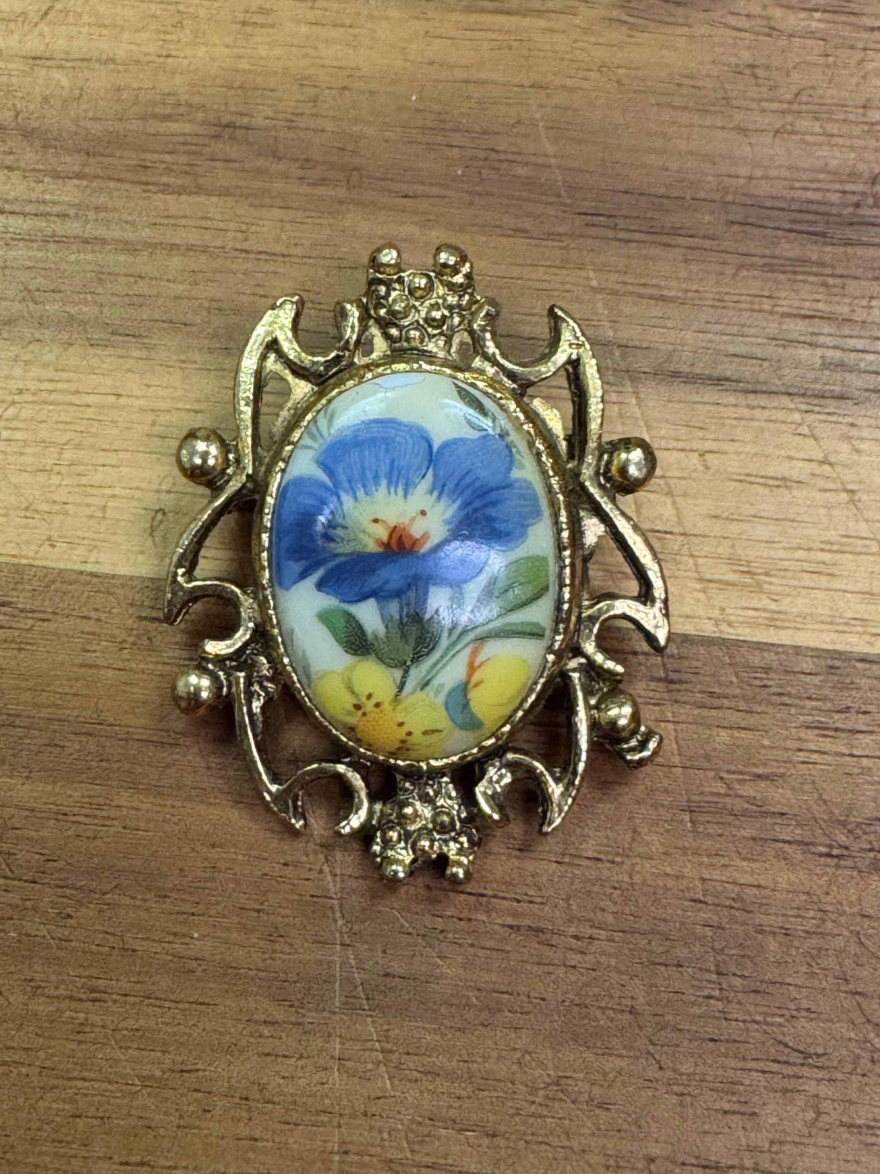 Vintage gold tone & porcelain brooch